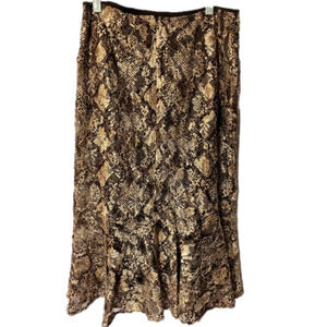 gorgeous skirt by ANDRE Oliver 17” waist laid flat , 34” length.